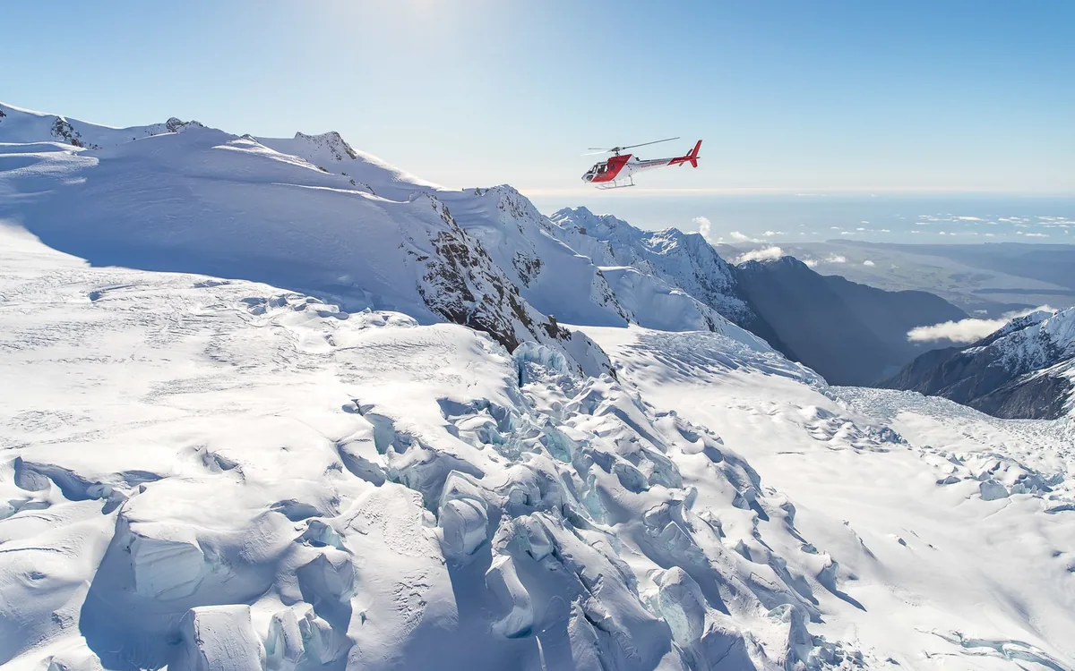 The blue icefall of Franz Josef Glacier photographed close up from a helicopter
